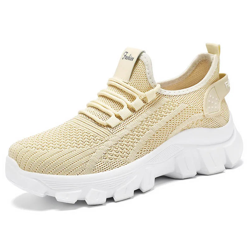 Women's breathable Flyknit sneaker with thick bottom PVC sole and round toe in white, pink, beige, or black.