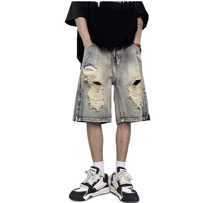 Blue retro denim shorts with wide-leg loose fit and tattered distressing details.