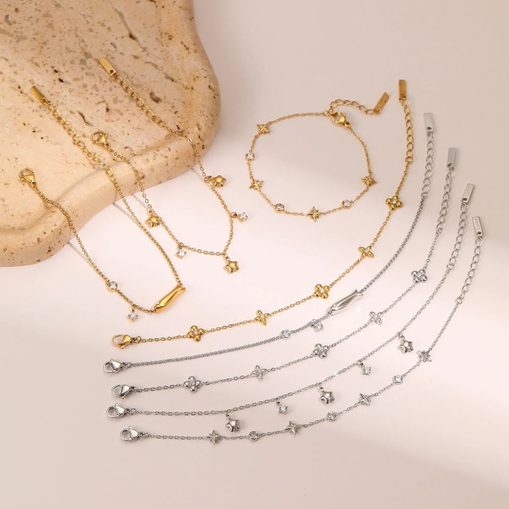 Women's titanium steel bracelet with gold plating and geometric star pendant