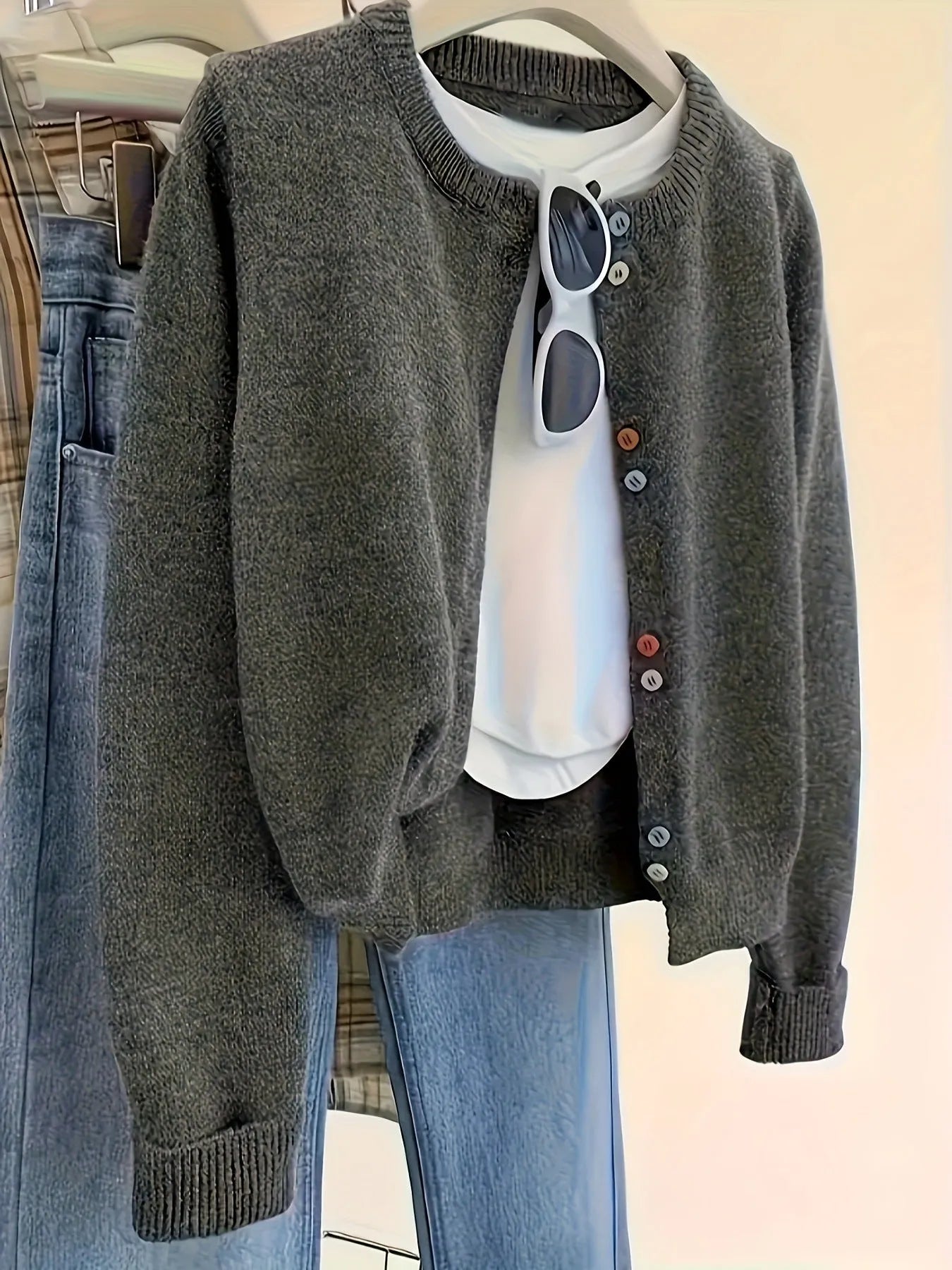 Dark grey women's cardigan sweater with button front and regular sleeve length