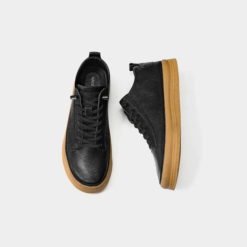 Men's black leather casual shoes with round toe and soft rubber soles shown from side view