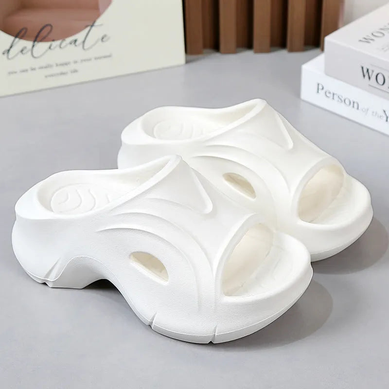 Women's thick-soled EVA slippers in rose red colour showing round toe design