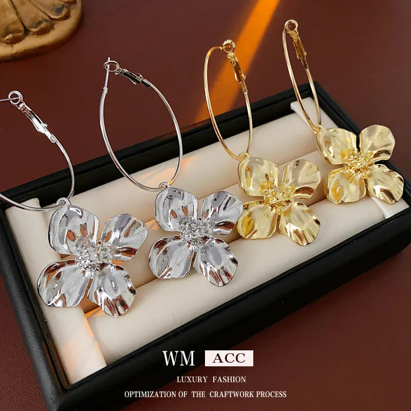Silver Needle metal flower earrings in geometric design with electroplated gold or silver finish