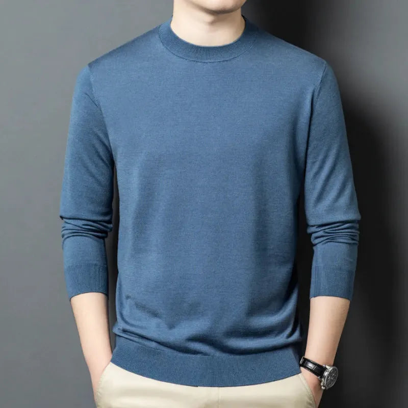 Men's round neck grey wool blend pullover sweater with long sleeves on a hanger.