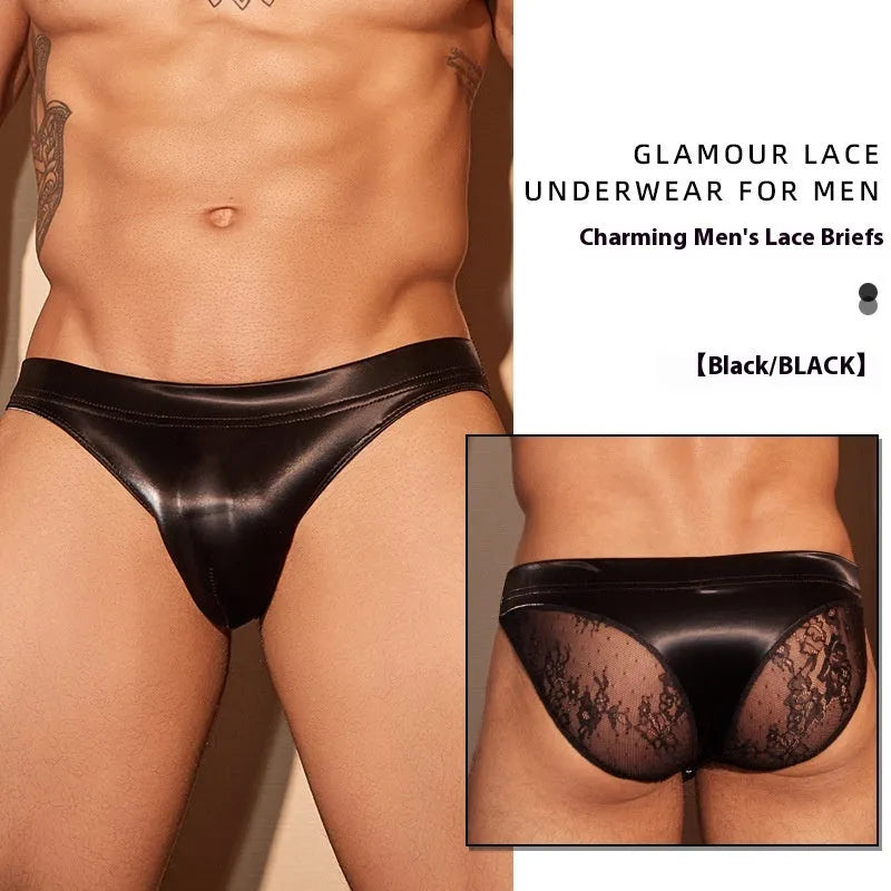 Men's black shark skin lace hip brief underwear laid flat, showing free size label.