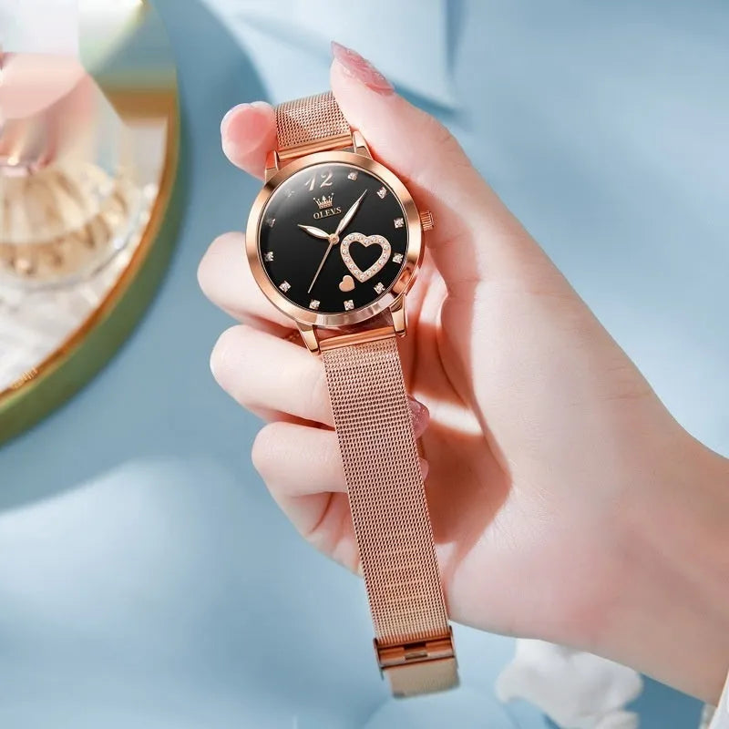 Rose gold women's fashion watch with mesh strap showing colour dial options: white, black, blue, red, pink, green.