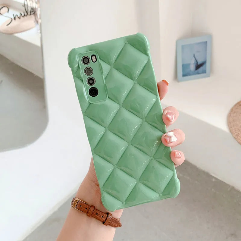 Silicone diamond pattern phone case for Huawei models in black, green, pink or white.
