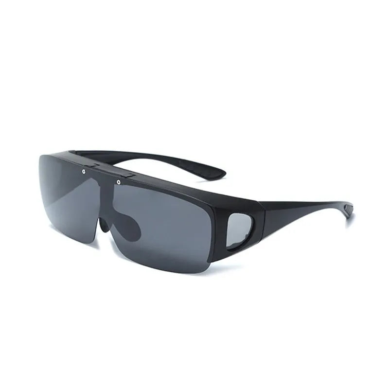 Sporty polarised myopia sunglasses with multiple interchangeable lenses including black, grey, and night vision, on a dark background.