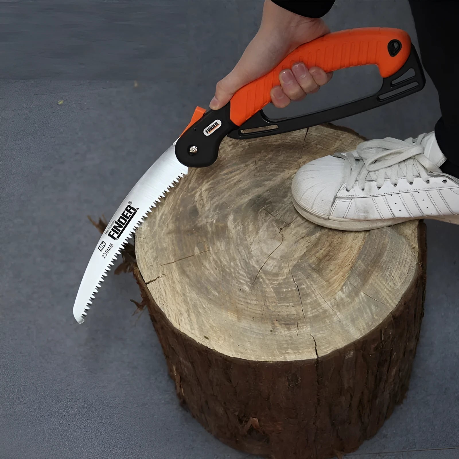 Folding garden saw with extended 230mm steel blade and black TPR grip, shown in open and closed positions.