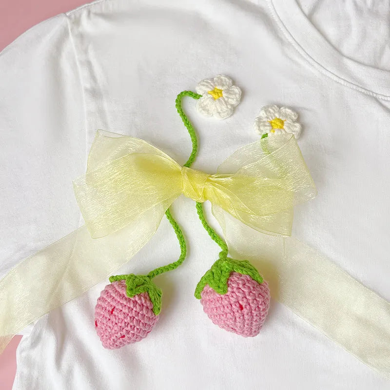 Wool crochet strawberry pendant with 35cm cord, knitted wool construction in pink or red colour