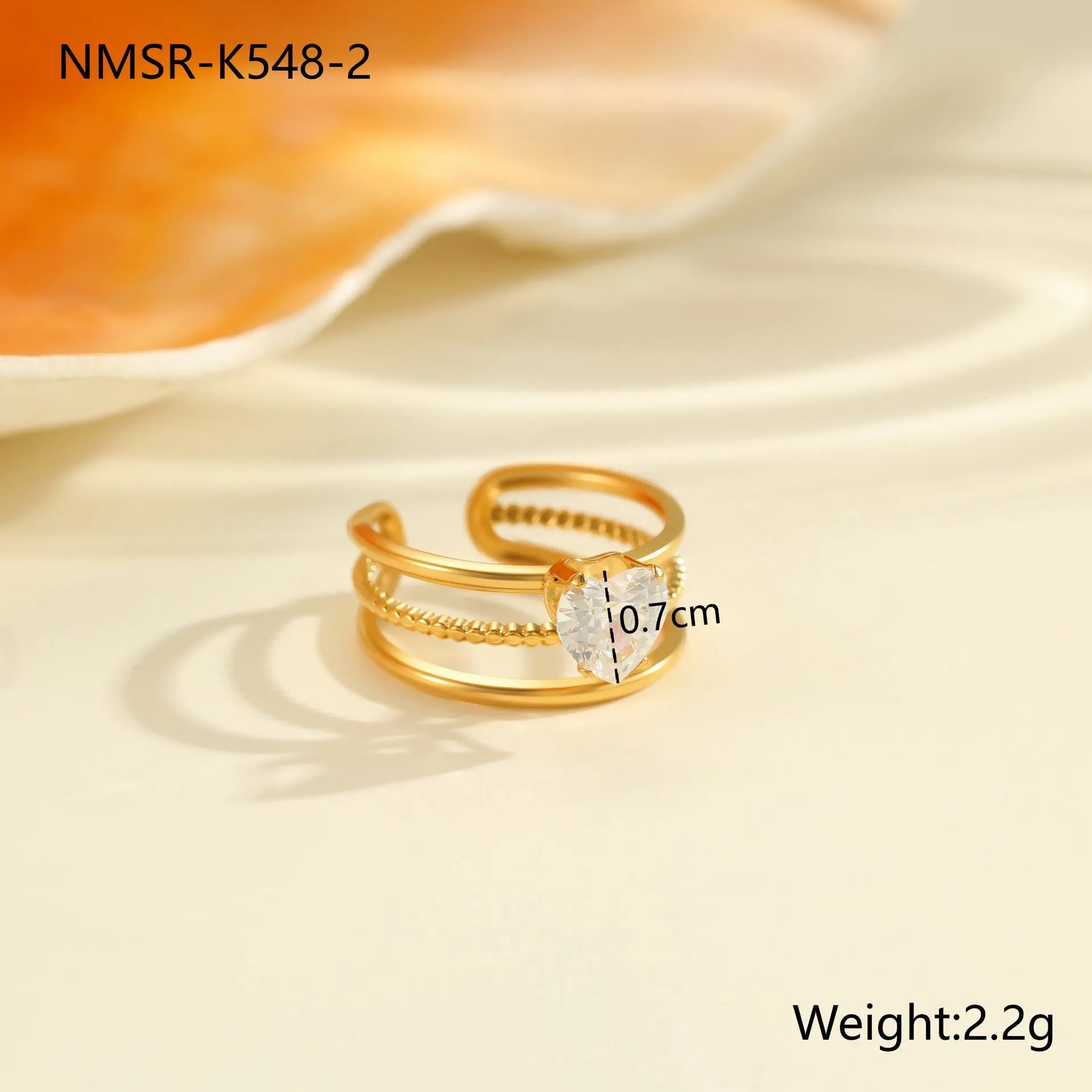 Gold electroplated stainless steel ring with zircon geometric design and open mouth adjustable fit