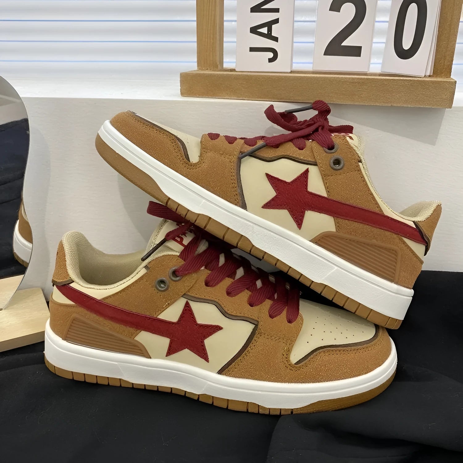 Brown women's platform sneakers with Pu leather upper, sequin details, and a lace-up front on a rubber sole.
