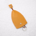 Cartoon pull-out car key case in PU leather with colourful designs measuring 14 x 7.5 cm