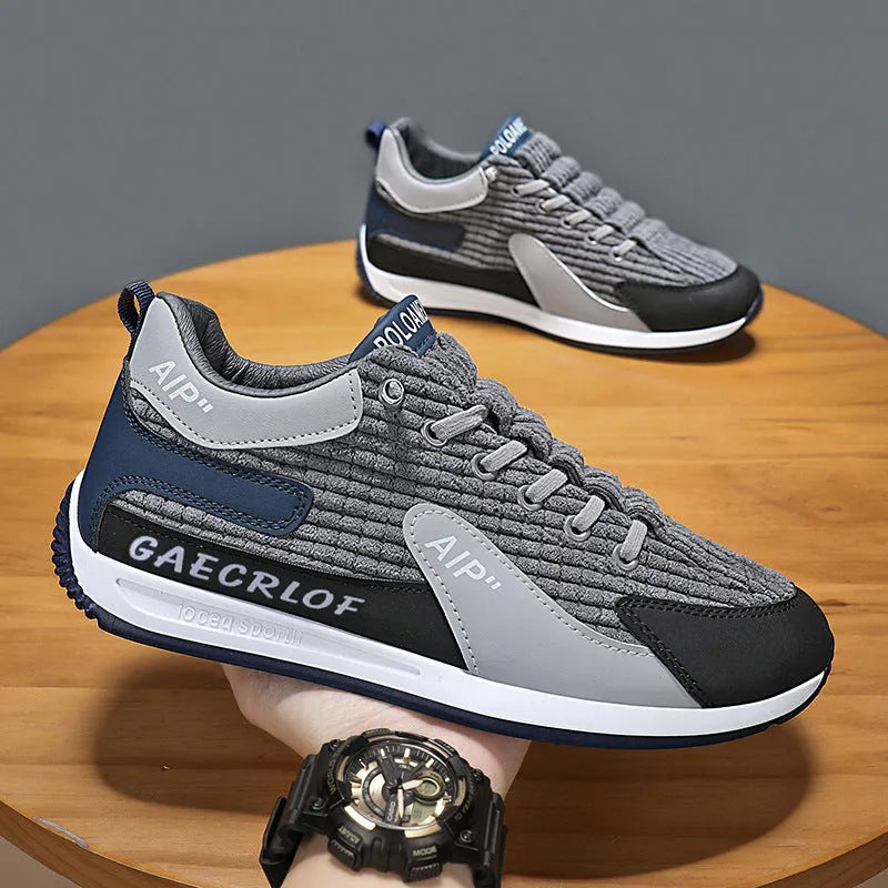 Men's grey mesh running shoes with lace-up closure and round toe design