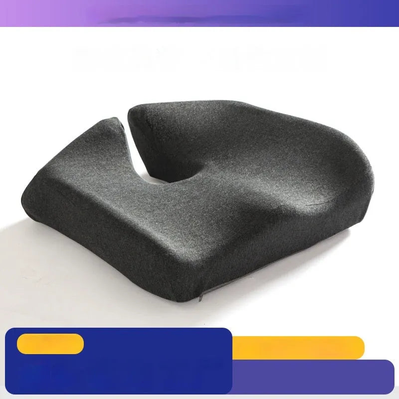 Black memory foam office chair cushion with dimensions 36x40cm on a grey desk chair