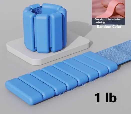 A black silicone weight-bearing bracelet with Velcro fastening, shown with 1lb and 2lb weight options.