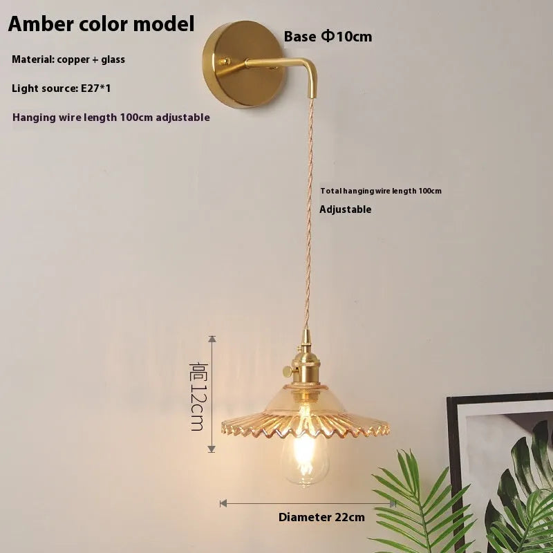 Copper retro lotus wall lamp with glass shade in amber colour variation