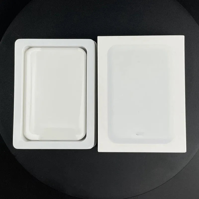 White magnetic wireless power bank with stand functionality showing 5000mAh capacity