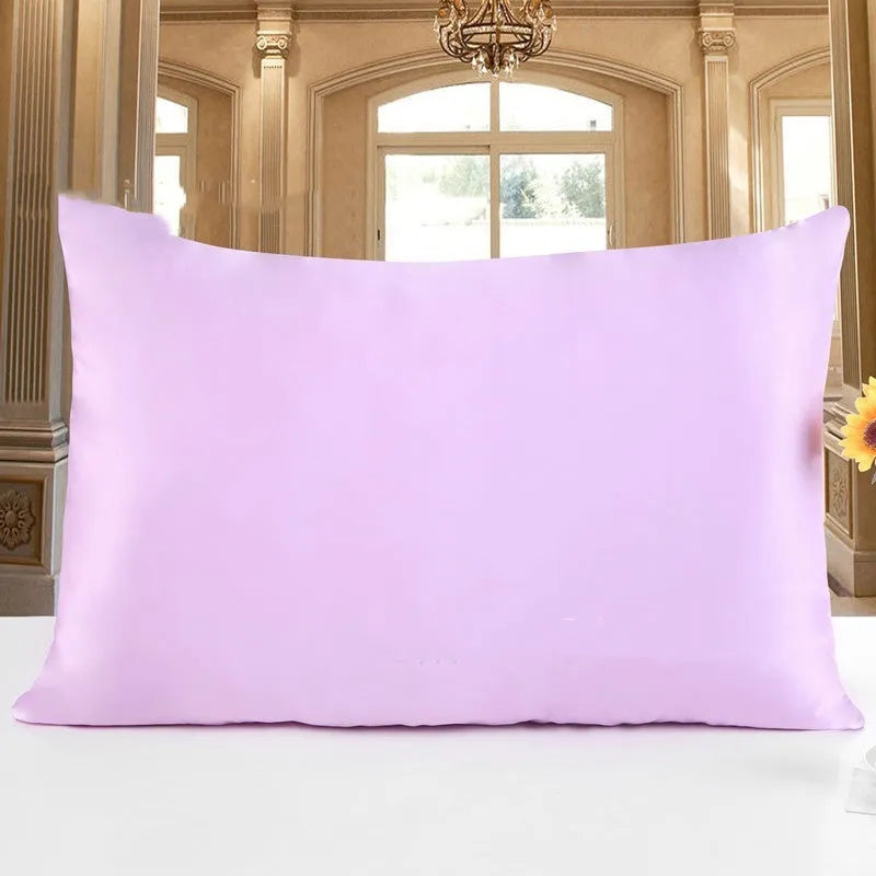 19 M double-sided silk pillowcase in apricot colour showing smooth texture and hem detail.