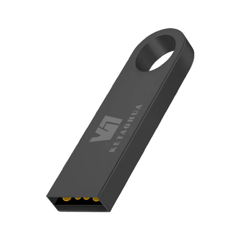 Silver metal car-shaped USB flash drive on a white background