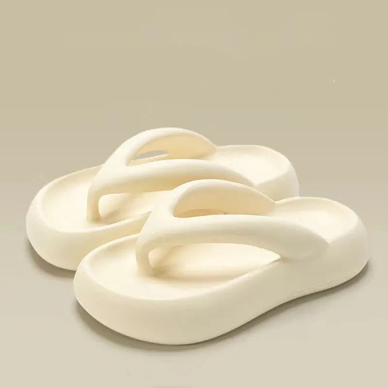 Solid colour EVA thong sandals with thick sole and a bow on the strap.