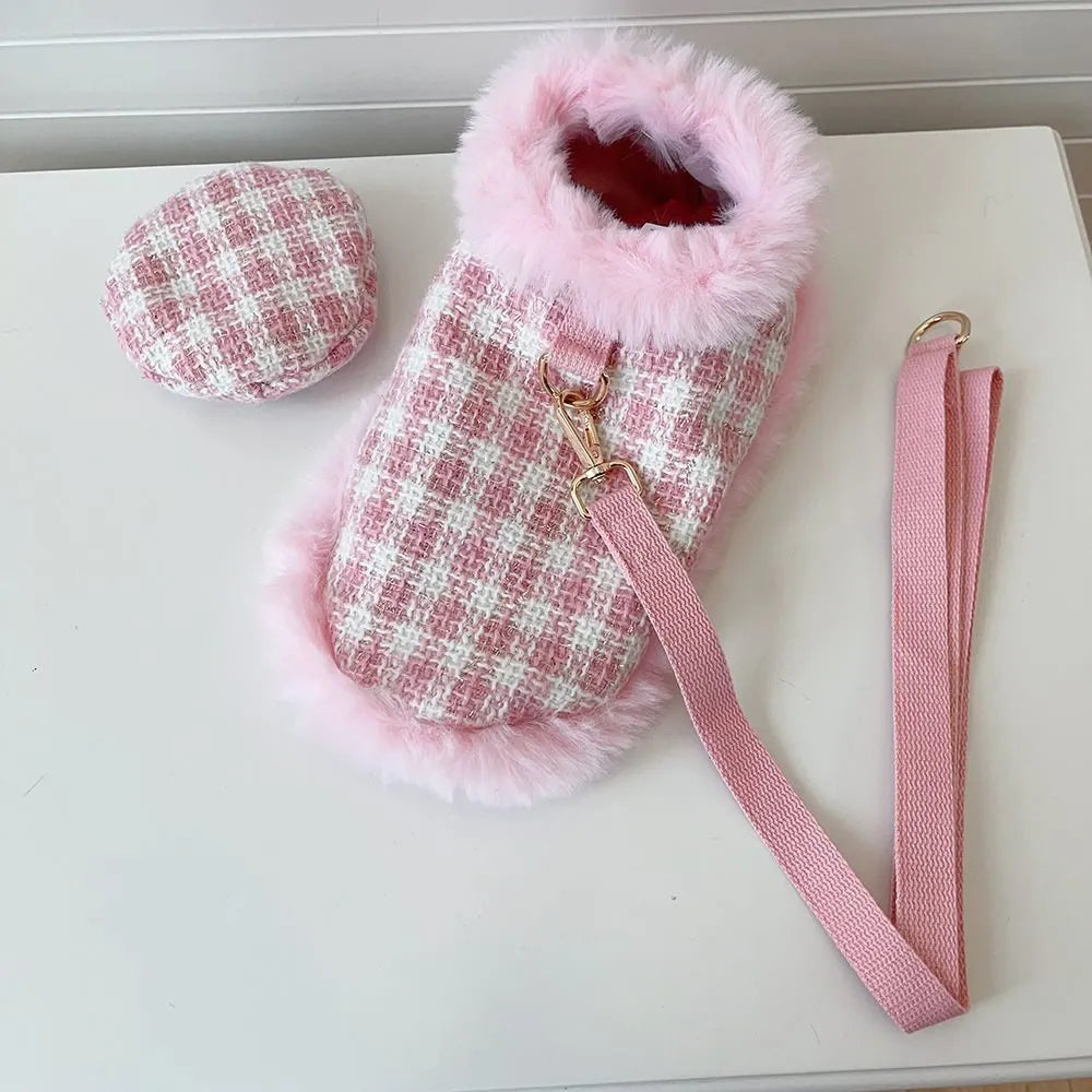 Pink polyester cat cloak with attached rope and matching beret for winter wear.