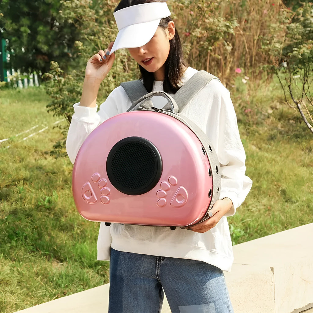 Transparent space capsule cat carrier bag with a metallic hard shell front cover