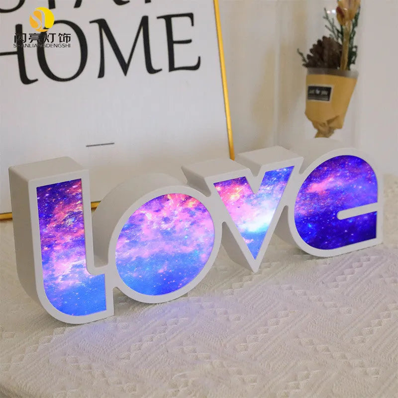 Rainbow style LED LOVE light decoration with plastic shell measuring 35.5cm by 13.5cm