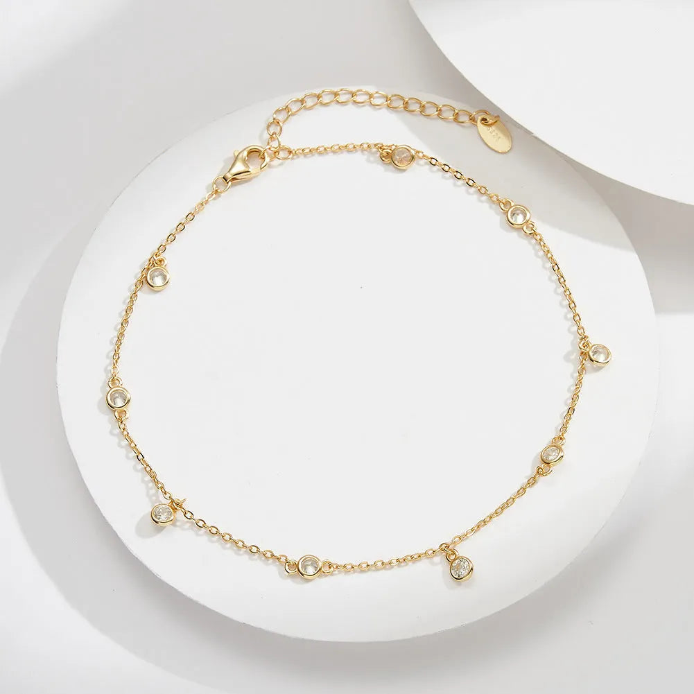 Silver geometric pendant anklet for women in a gold colour finish.