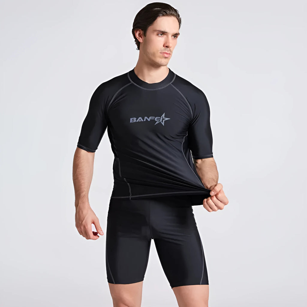 Men's quick-drying half sleeve swim suit with separate swim top and pants in navy blue.