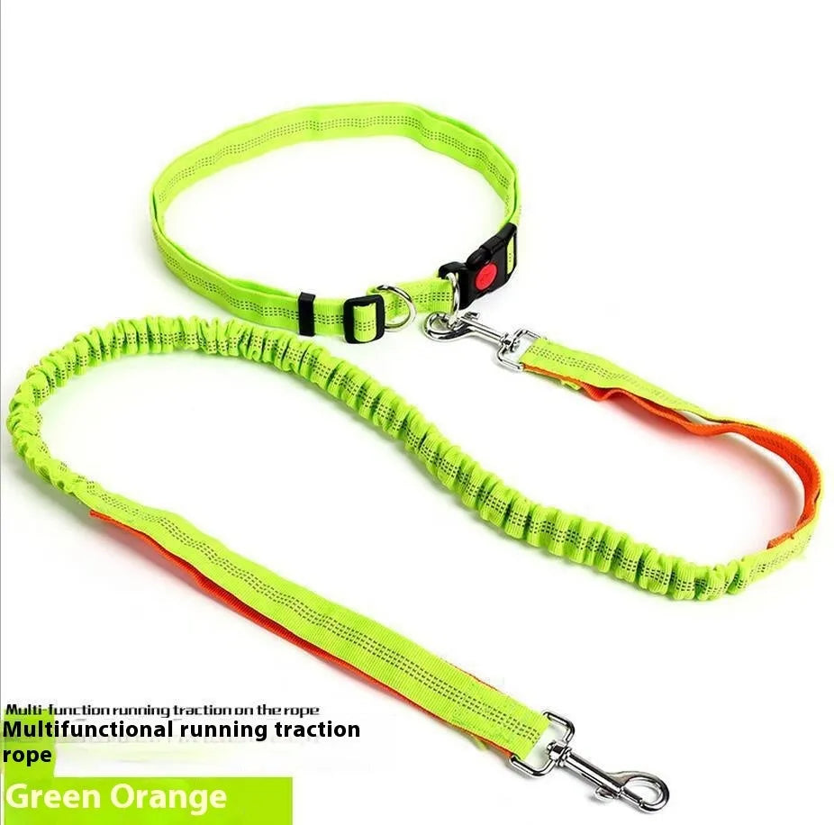 Grey and green reflective dog leash with elastic section shown on a table.