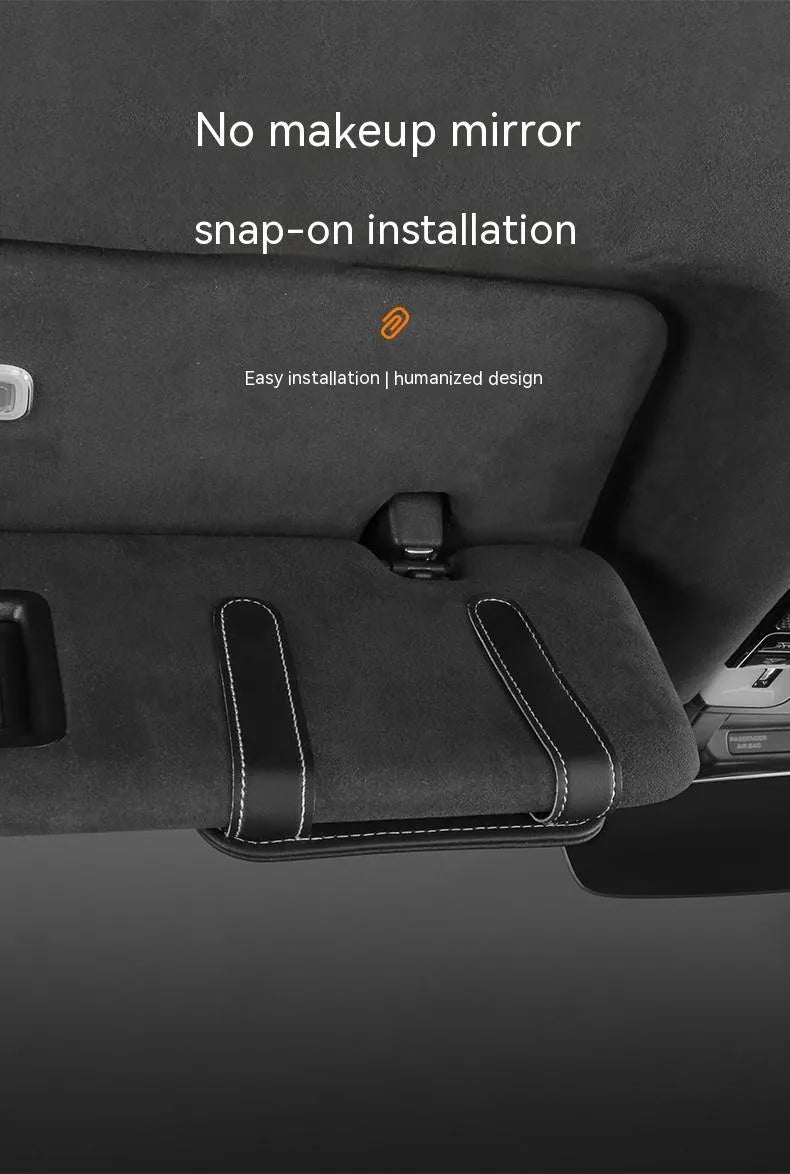 Beige leather car sun visor card holder with a glasses clip shown installed on a vehicle visor.