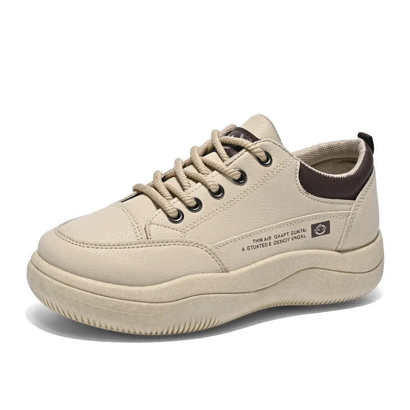 Women's white Korean-style low-top pumps with cross straps and round toe on a rubber sole.
