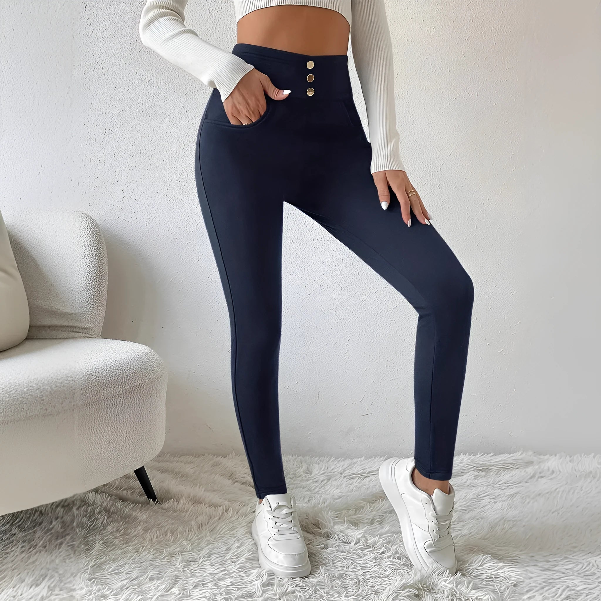 Navy blue women's high waist slim fit straight leg casual trousers on a hanger.