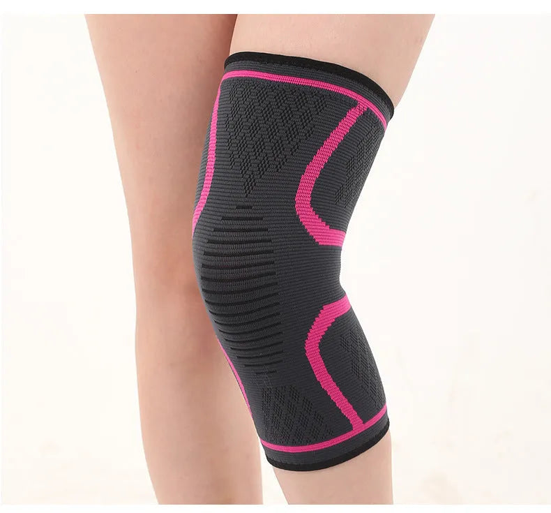Stretch polyester sports kneepad with corrugated texture in black, shown on a knee.