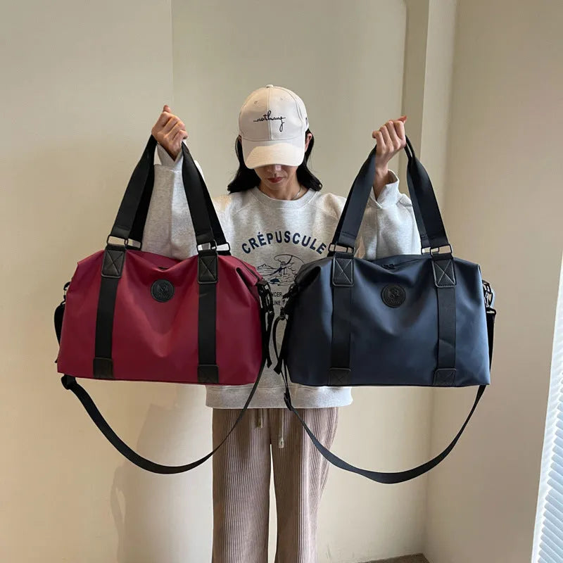 Large capacity waterproof travel bag in Oxford cloth with 36-55 litre storage