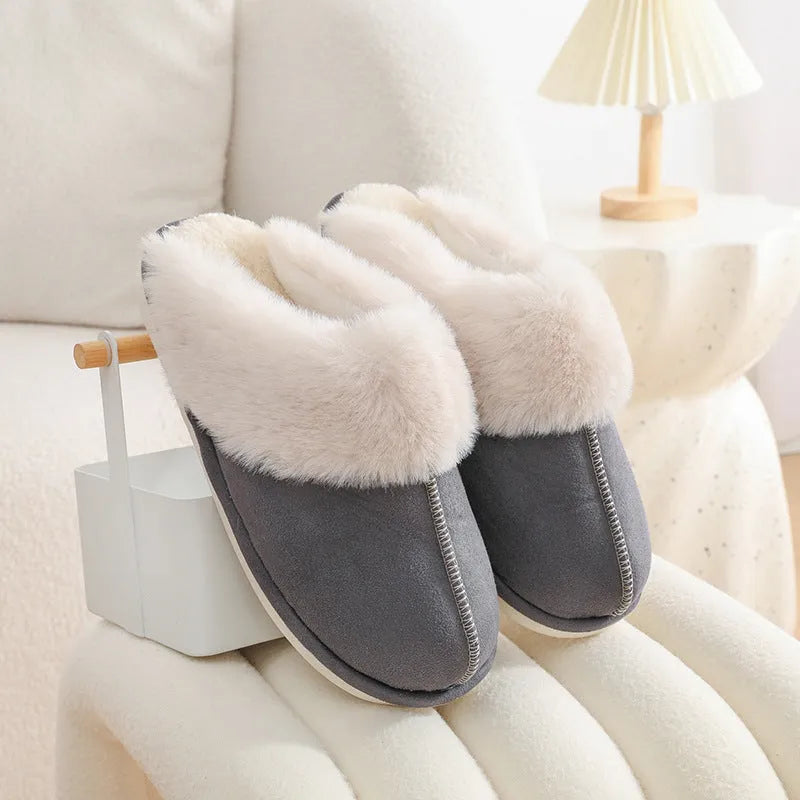 Women's winter plush slippers with round toe design in brown colour showing stitching detail