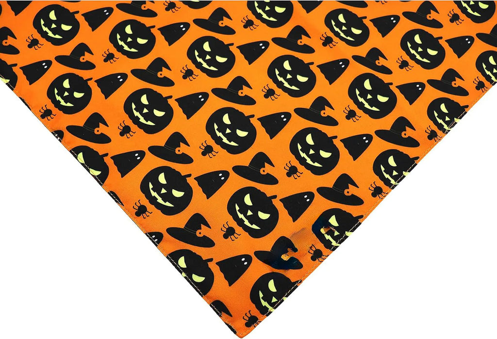 Reversible Halloween dog bandana showing pumpkin and spider web designs in black and orange colours with adjustable neck closure
