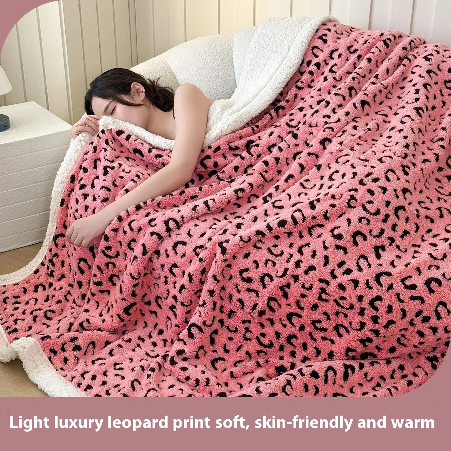 Double-layer Jacquard taffeta blanket with leopard print design in camel colour folded to show texture and pattern detail