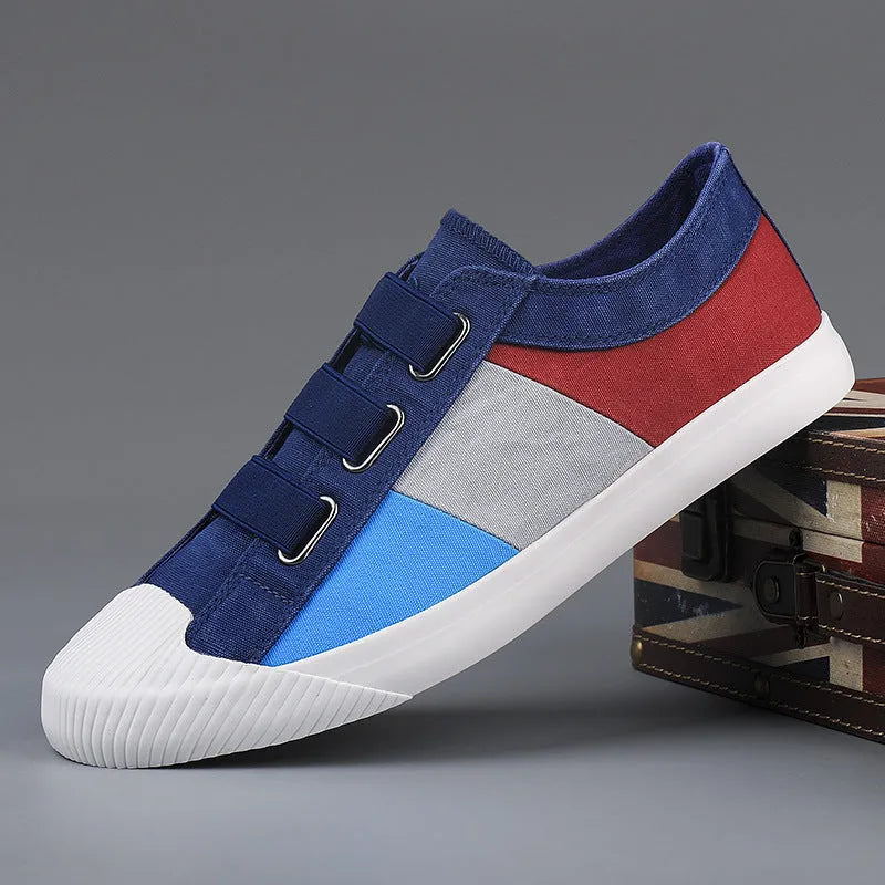 Men's low-top canvas sneakers with elastic band fastening in beige colour.