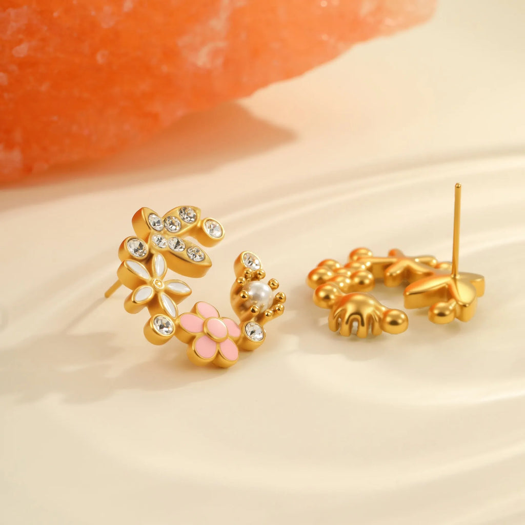 Gold flower stud earrings with petal design on stainless steel backing