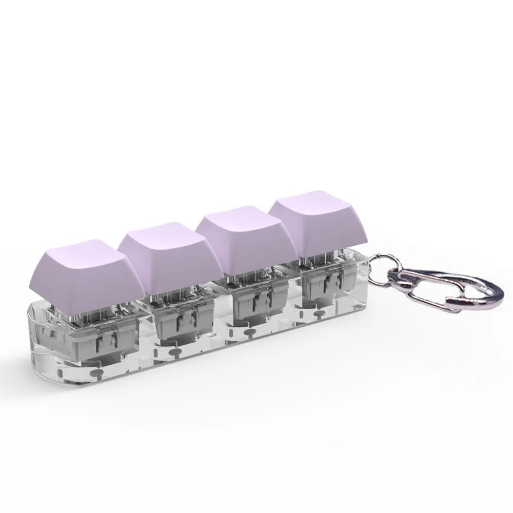 4-key mechanical keyboard switch tester with transparent bottom shell on desk