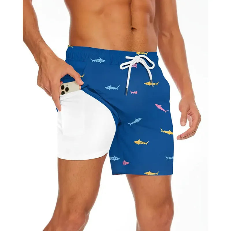 Man wearing loose-fit beige polyester beach shorts on a summer day.