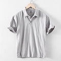 Men's loose fit linen and cotton casual shirt in a solid colour, shown in light grey.