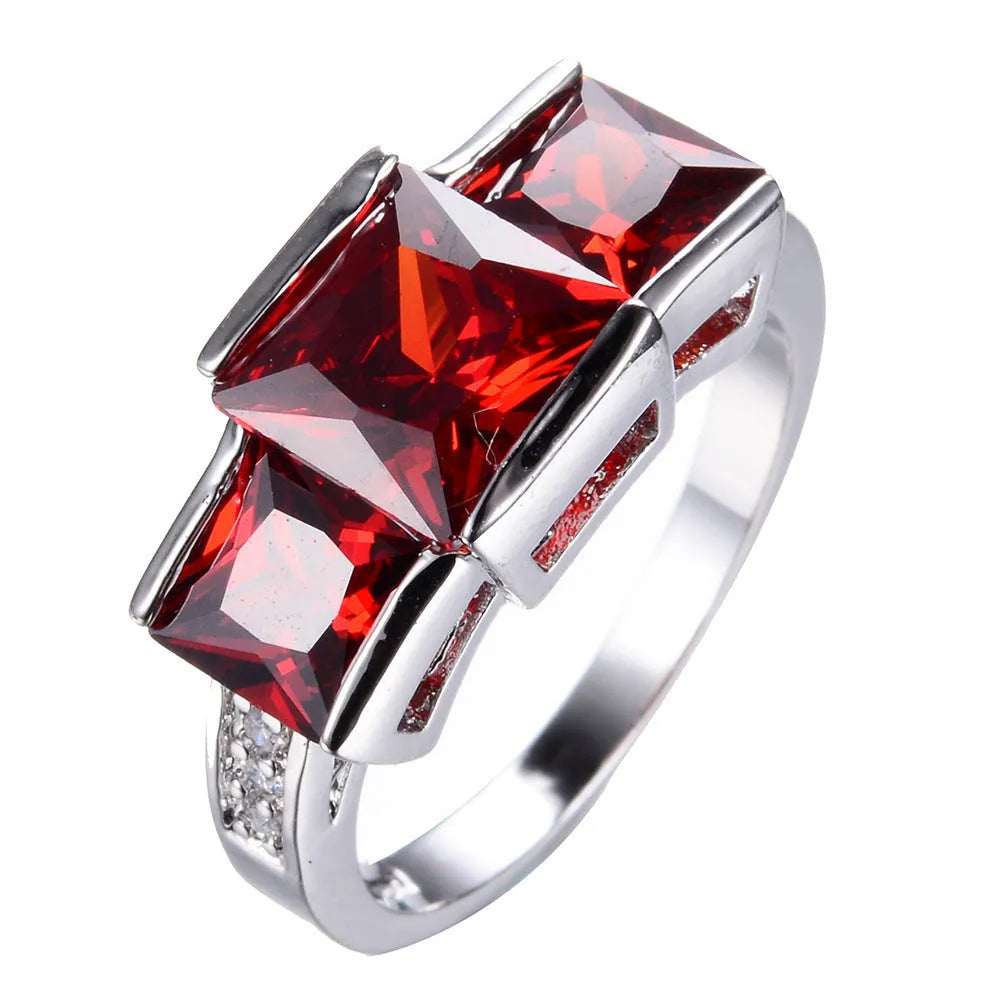 Women's geometric rainbow metal ring in electroplated copper showing colour options.