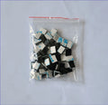 Black PA66 nylon cable management clip for automotive and electronic wiring.