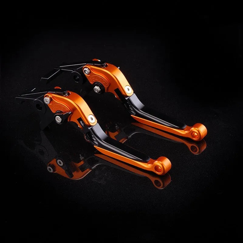 Pair of anodised metal motorcycle brake and clutch levers with adjustable length mechanism