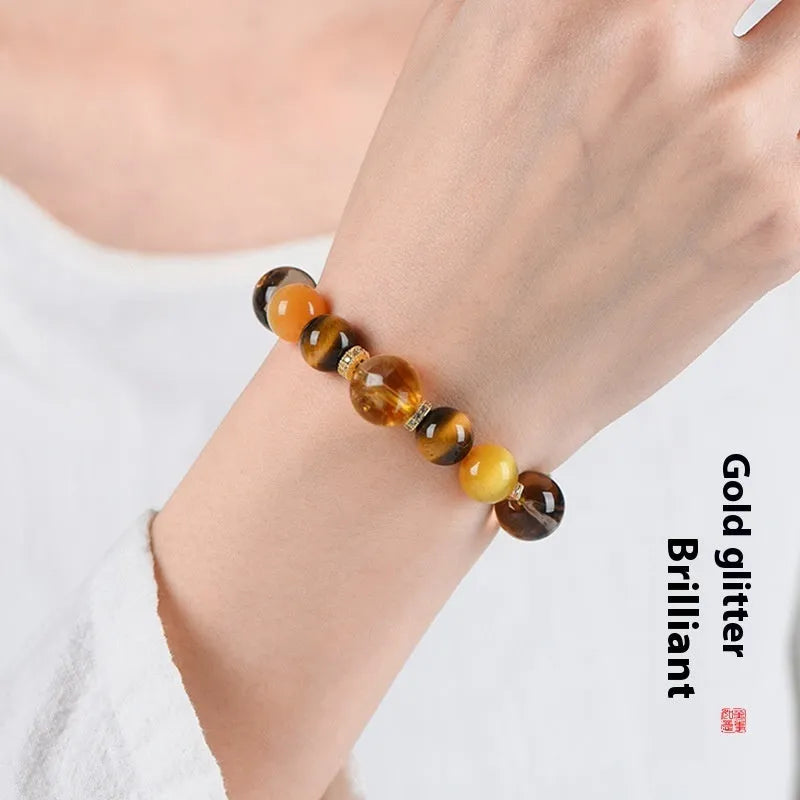 Handmade yellow artificial crystal bead bracelet with 10mm Jinba style beads and adjustable string closure