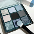 MUGELEEN nine-colour eye shadow palette shade 08 showing matte and shimmer blue smoked tones