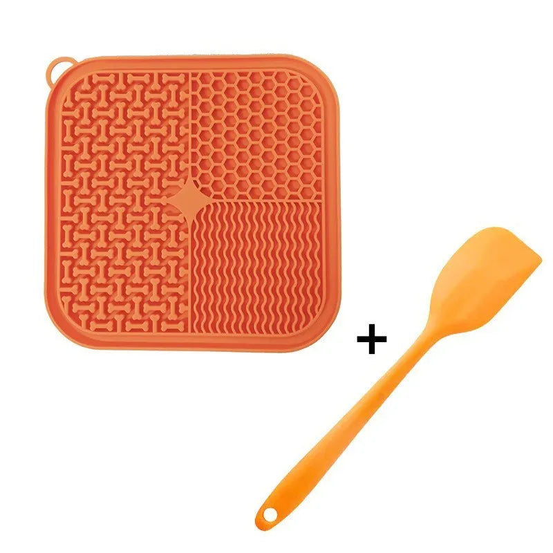 Blue silicone dog licking mat with textured pattern and suction cups on back